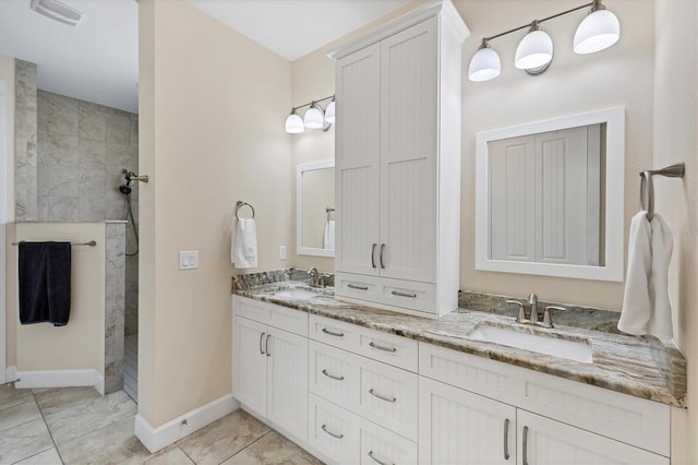 8127 Consul St, Port Charlotte, FL 33981 - bathroom featuring double vanity and a walk in shower