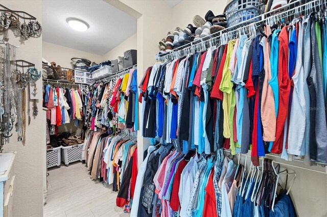 8127 Consul St, Port Charlotte, FL 33981 - walk in closet with wood finished floors