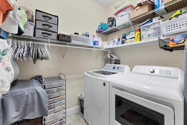 8127 Consul St, Port Charlotte, FL 33981 - laundry room featuring washer and clothes dryer and light marble finish floors