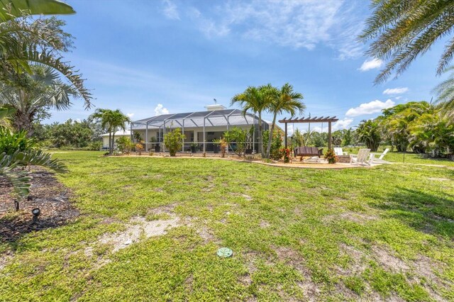8127 Consul St, Port Charlotte, FL 33981 - view of green lawn featuring a patio area, glass enclosure, and a pergola