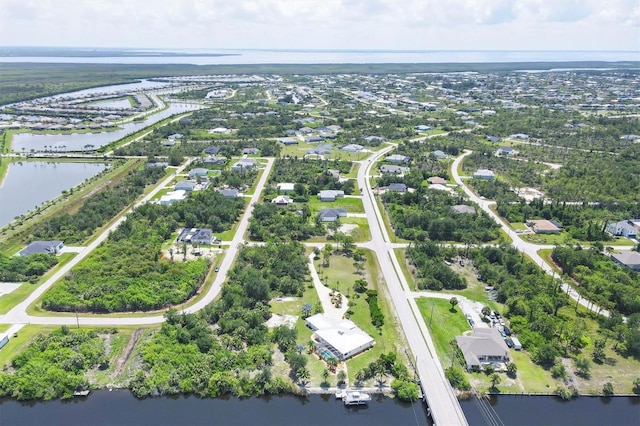 8127 Consul St, Port Charlotte, FL 33981 - aerial overview of property's location featuring a large body of water