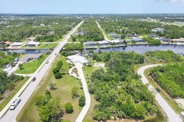 8127 Consul St, Port Charlotte, FL 33981 - aerial view of property's location featuring a nearby body of water and nearby suburban area