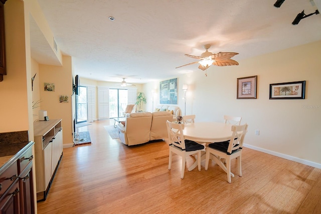 7303 Jessie Harbor Dr Unit 7303, Osprey, FL 34229 - dining area featuring light wood-type flooring and ceiling fan