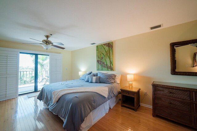 7303 Jessie Harbor Dr Unit 7303, Osprey, FL 34229 - bedroom with access to outside, light wood-style floors, and a ceiling fan