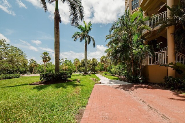 7303 Jessie Harbor Dr Unit 7303, Osprey, FL 34229 - view of community with a lawn