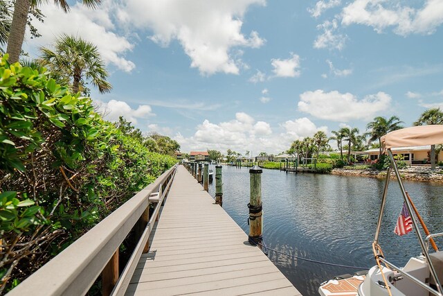7303 Jessie Harbor Dr Unit 7303, Osprey, FL 34229 - dock area featuring a water view