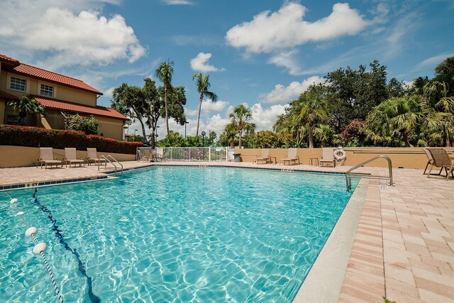 7303 Jessie Harbor Dr Unit 7303, Osprey, FL 34229 - community pool with a patio