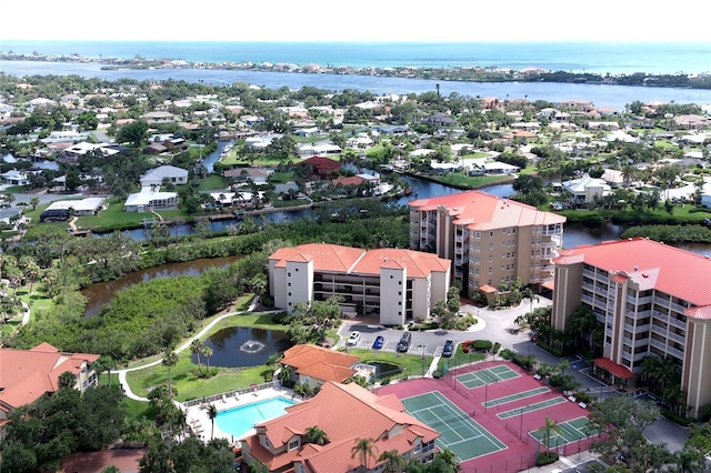 7303 Jessie Harbor Dr Unit 7303, Osprey, FL 34229 - aerial view of a large body of water and apartment complex / building