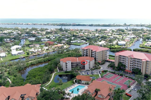 7303 Jessie Harbor Dr Unit 7303, Osprey, FL 34229 - bird's eye view of a large body of water and apartment complex