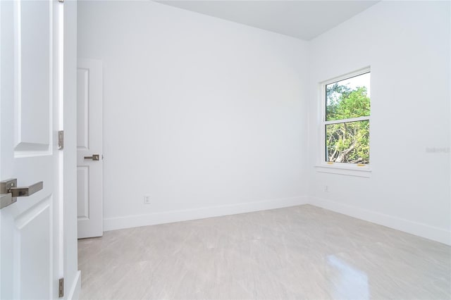 482 Sunset Rd N, Rotonda West, FL 33947 - spare room featuring baseboards