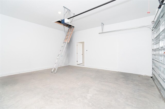 482 Sunset Rd N, Rotonda West, FL 33947 - garage featuring a garage door opener
