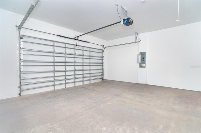 482 Sunset Rd N, Rotonda West, FL 33947 - garage with electric panel and a garage door opener