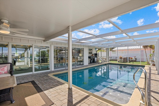 7530 Whitcomb St, Englewood, FL 34223 - view of swimming pool featuring a patio, a lanai, and a ceiling fan