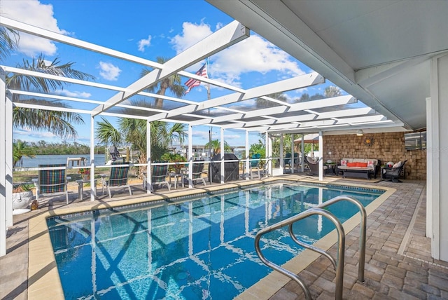 7530 Whitcomb St, Englewood, FL 34223 - outdoor pool with outdoor lounge area, a patio, and glass enclosure
