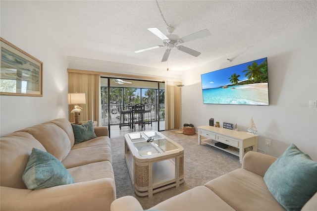 1501 Beach Rd Unit 310, Englewood, FL 34223 - living area featuring a textured ceiling and a ceiling fan