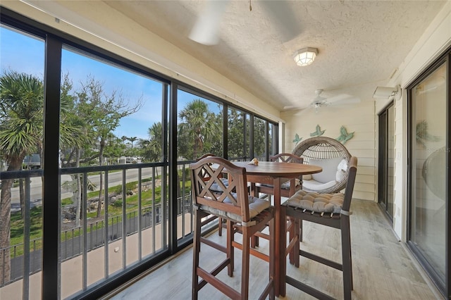 1501 Beach Rd Unit 310, Englewood, FL 34223 - sunroom featuring a ceiling fan