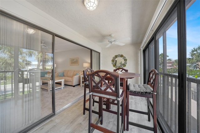 1501 Beach Rd Unit 310, Englewood, FL 34223 - sunroom / solarium with wood finished floors and a textured ceiling