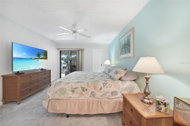 1501 Beach Rd Unit 310, Englewood, FL 34223 - bedroom with carpet, access to outside, ceiling fan, and baseboards