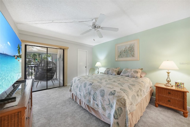1501 Beach Rd Unit 310, Englewood, FL 34223 - carpeted bedroom featuring access to outside, baseboards, and a ceiling fan