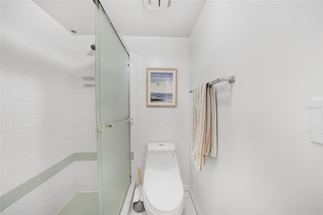 1501 Beach Rd Unit 310, Englewood, FL 34223 - bathroom with a shower stall and toilet