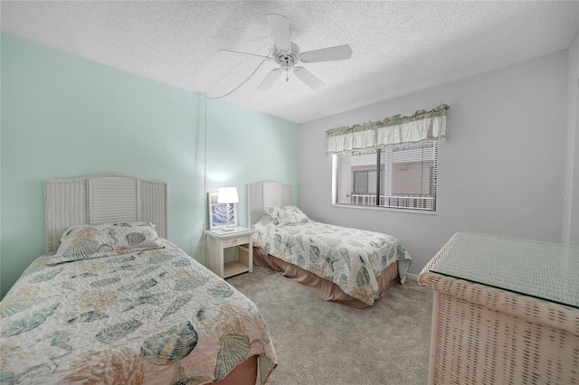 1501 Beach Rd Unit 310, Englewood, FL 34223 - bedroom featuring carpet, a textured ceiling, and ceiling fan