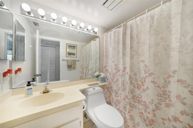 1501 Beach Rd Unit 310, Englewood, FL 34223 - full bathroom featuring toilet and vanity