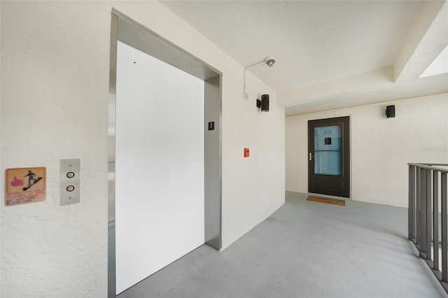 1501 Beach Rd Unit 310, Englewood, FL 34223 - property entrance featuring elevator and stucco siding