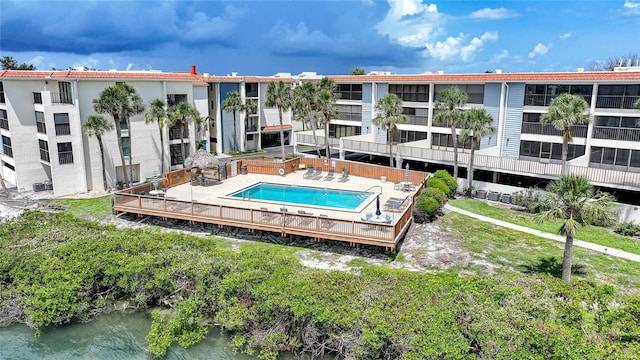 1501 Beach Rd Unit 310, Englewood, FL 34223 - back of property with a community pool, stucco siding, and a water view