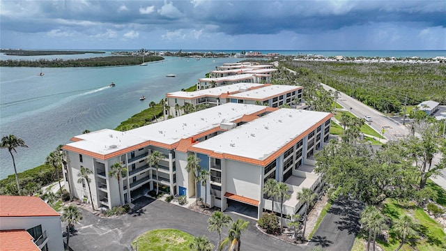 1501 Beach Rd Unit 310, Englewood, FL 34223 - drone / aerial view of a large body of water and apartment complex / building