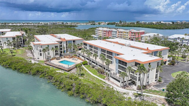 1501 Beach Rd Unit 310, Englewood, FL 34223 - drone / aerial view of apartment complex, a large body of water, and a pool