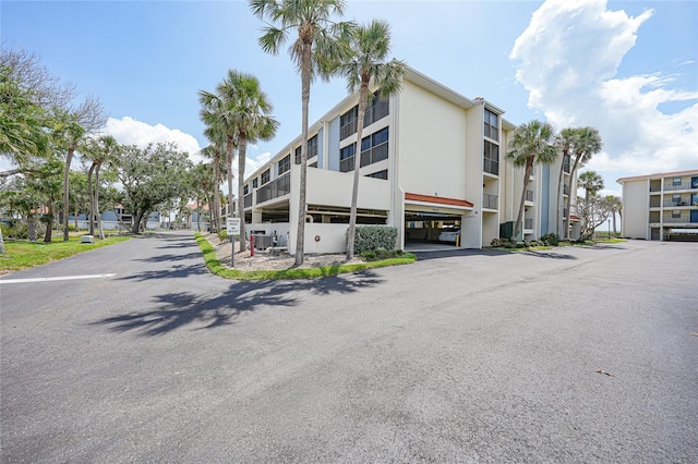 1501 Beach Rd Unit 310, Englewood, FL 34223 - view of building exterior featuring central AC