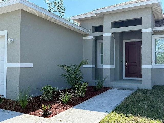 311 Yule St, Port Charlotte, FL 33953 - entrance to property with stucco siding