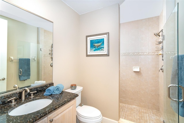 1375 Beach Rd Unit 201, Englewood, FL 34223 - bathroom with a shower stall, toilet, and vanity