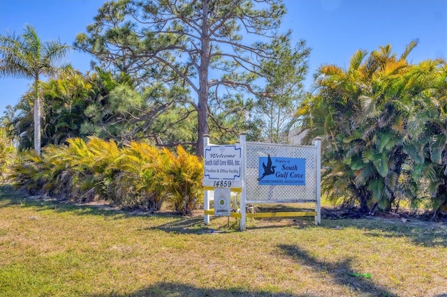 10242 Hallendale Dr, Port Charlotte, FL 33981 - community sign featuring a yard