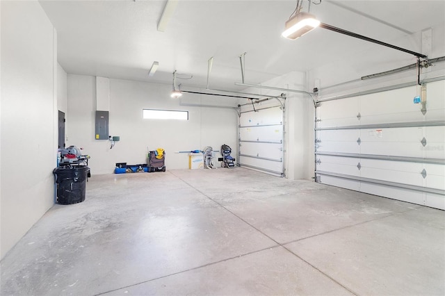 10454 Atenia St, Port Charlotte, FL 33981 - garage featuring electric panel and a garage door opener