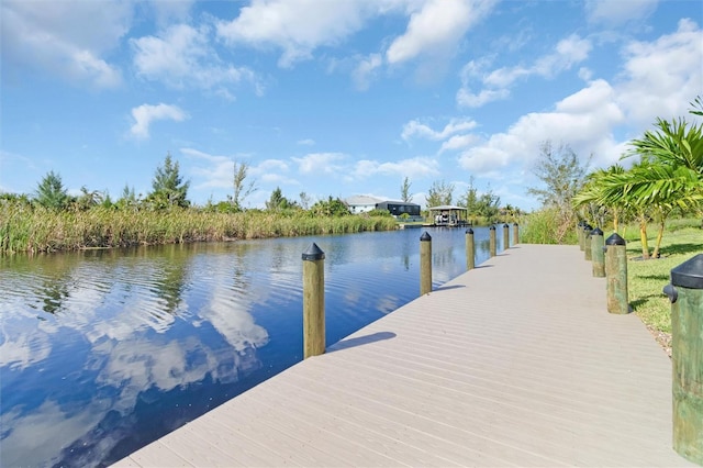 10454 Atenia St, Port Charlotte, FL 33981 - dock area featuring a water view