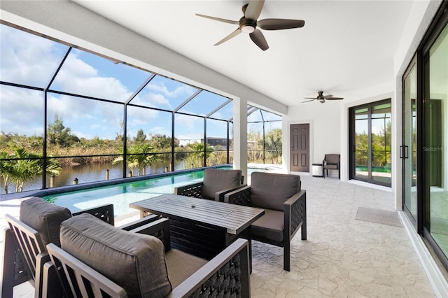 10454 Atenia St, Port Charlotte, FL 33981 - view of patio / terrace with ceiling fan, a water view, an outdoor pool, an outdoor hangout area, and a lanai