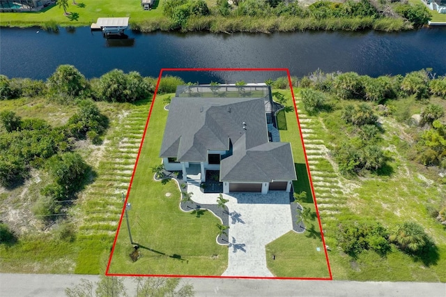10454 Atenia St, Port Charlotte, FL 33981 - aerial view of property and surrounding area featuring a large body of water and property boundaries highlighted