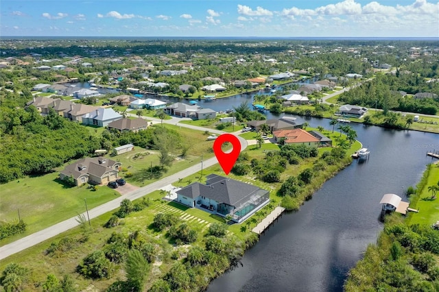 10454 Atenia St, Port Charlotte, FL 33981 - aerial view of property and surrounding area featuring a nearby body of water and nearby suburban area