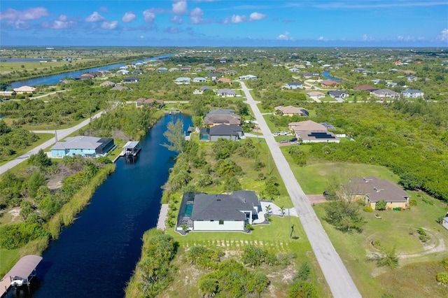 10454 Atenia St, Port Charlotte, FL 33981 - aerial view of property and surrounding area with a nearby body of water and nearby suburban area
