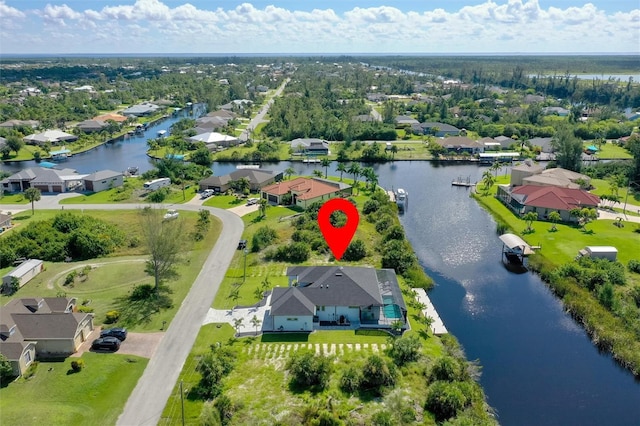 10454 Atenia St, Port Charlotte, FL 33981 - aerial view of residential area featuring a nearby body of water