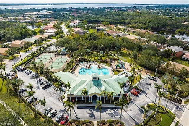 13091 Sandy Key Bnd Unit 104, North Fort Myers, FL 33903 - aerial view of residential area with a pool area and a nearby body of water