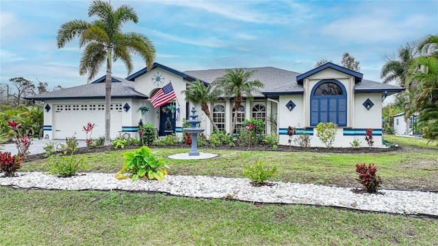 13703 Drysdale Ave, Port Charlotte, FL 33981 - ranch-style house featuring a front yard, an attached garage, stucco siding, and driveway