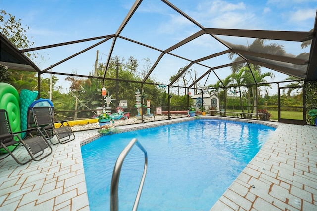 13703 Drysdale Ave, Port Charlotte, FL 33981 - outdoor pool featuring a patio and glass enclosure