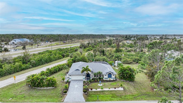 13703 Drysdale Ave, Port Charlotte, FL 33981 - view from above of property with a tree filled landscape