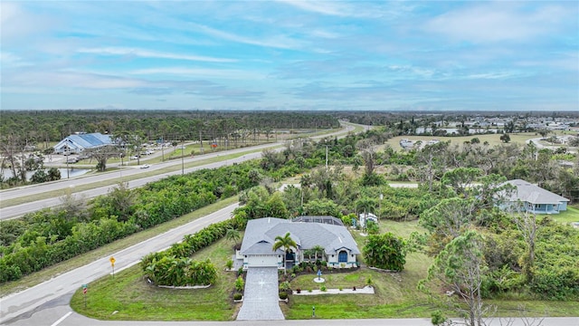 13703 Drysdale Ave, Port Charlotte, FL 33981 - drone / aerial view of a tree filled landscape