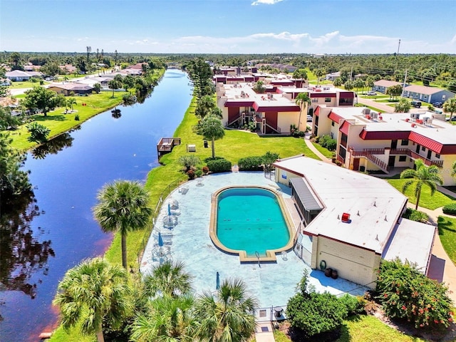 96 Boundary Blvd Unit 112, Rotonda West, FL 33947 - aerial perspective of suburban area with a nearby body of water and a pool