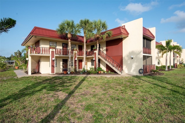 96 Boundary Blvd Unit 112, Rotonda West, FL 33947 - view of property featuring stairs