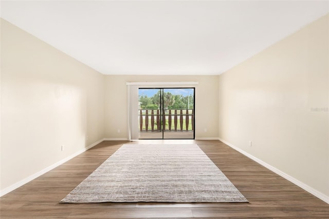 96 Boundary Blvd Unit 112, Rotonda West, FL 33947 - empty room featuring baseboards and wood finished floors