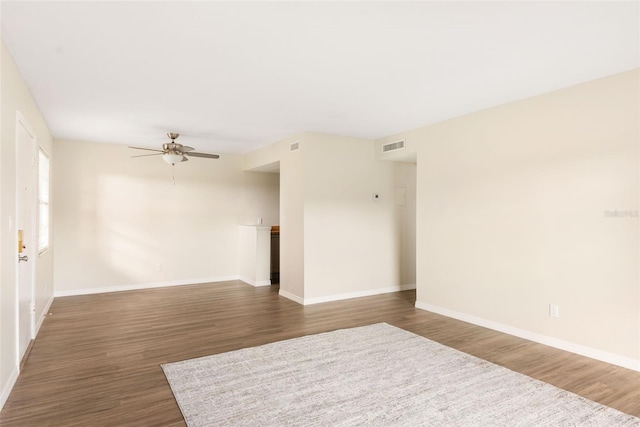 96 Boundary Blvd Unit 112, Rotonda West, FL 33947 - unfurnished room with ceiling fan, wood finished floors, and baseboards